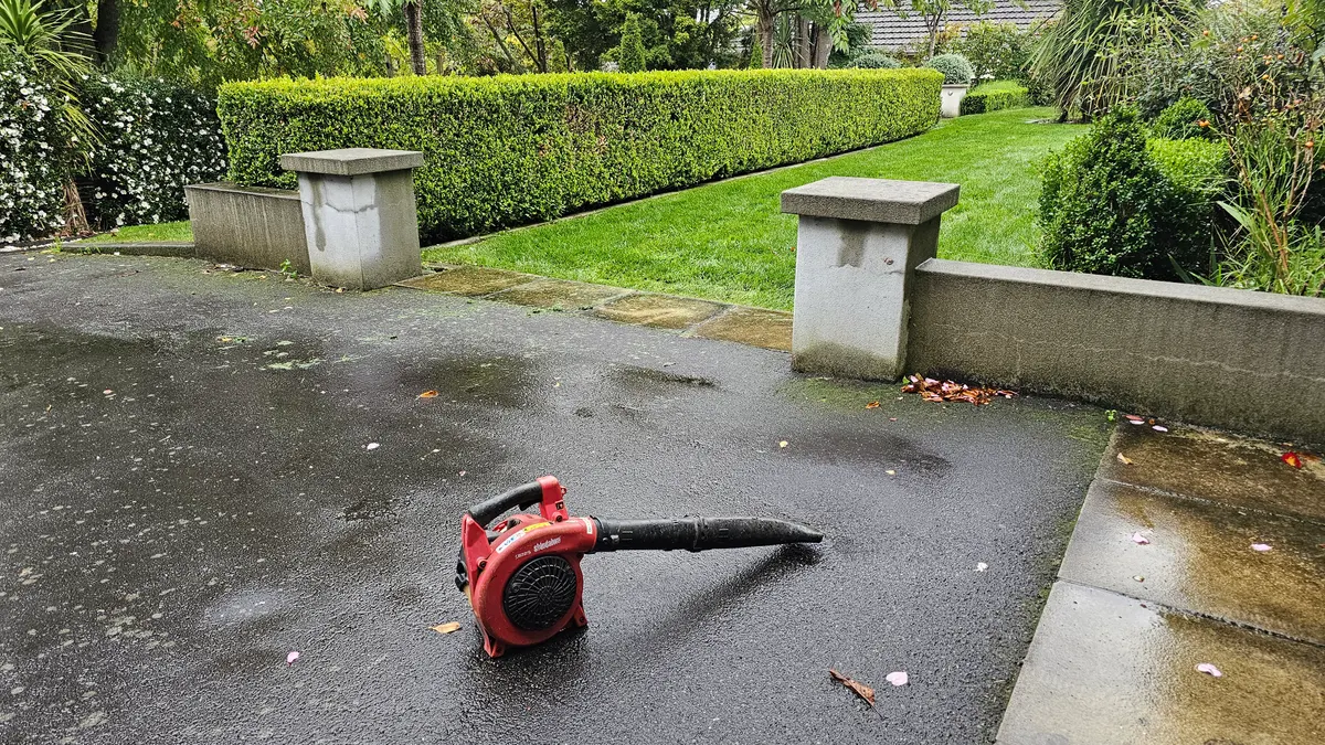 Petrol blower on a path after mowing
