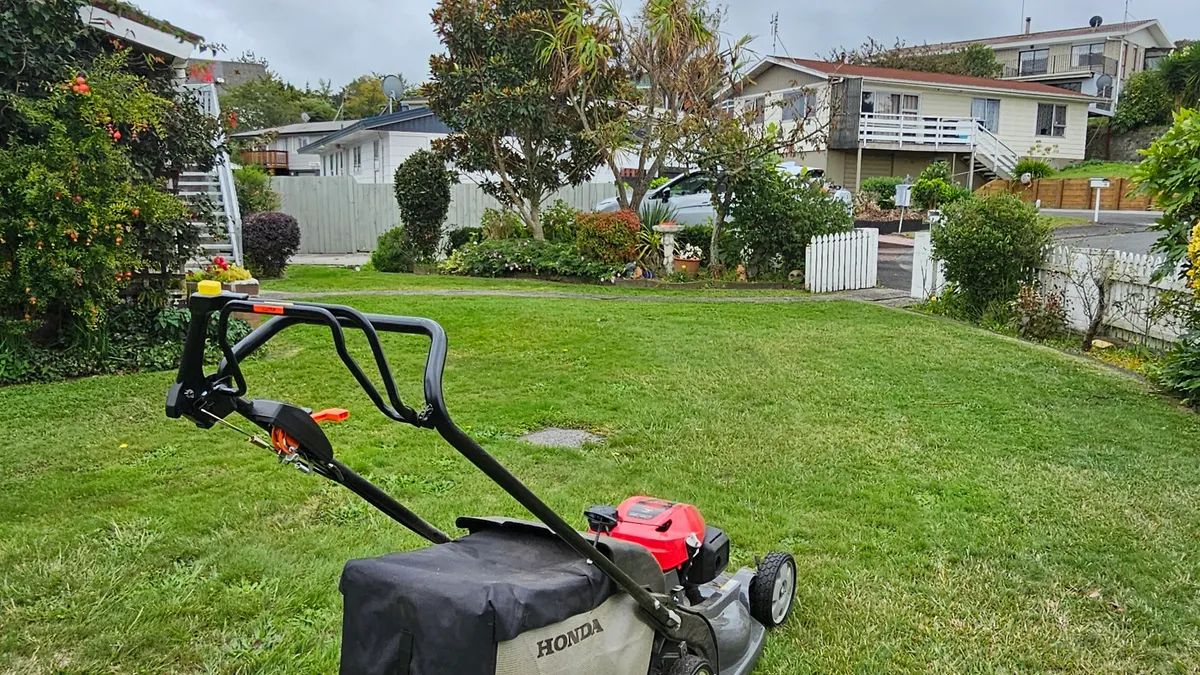 Honda mower on a regular customer's front lawn