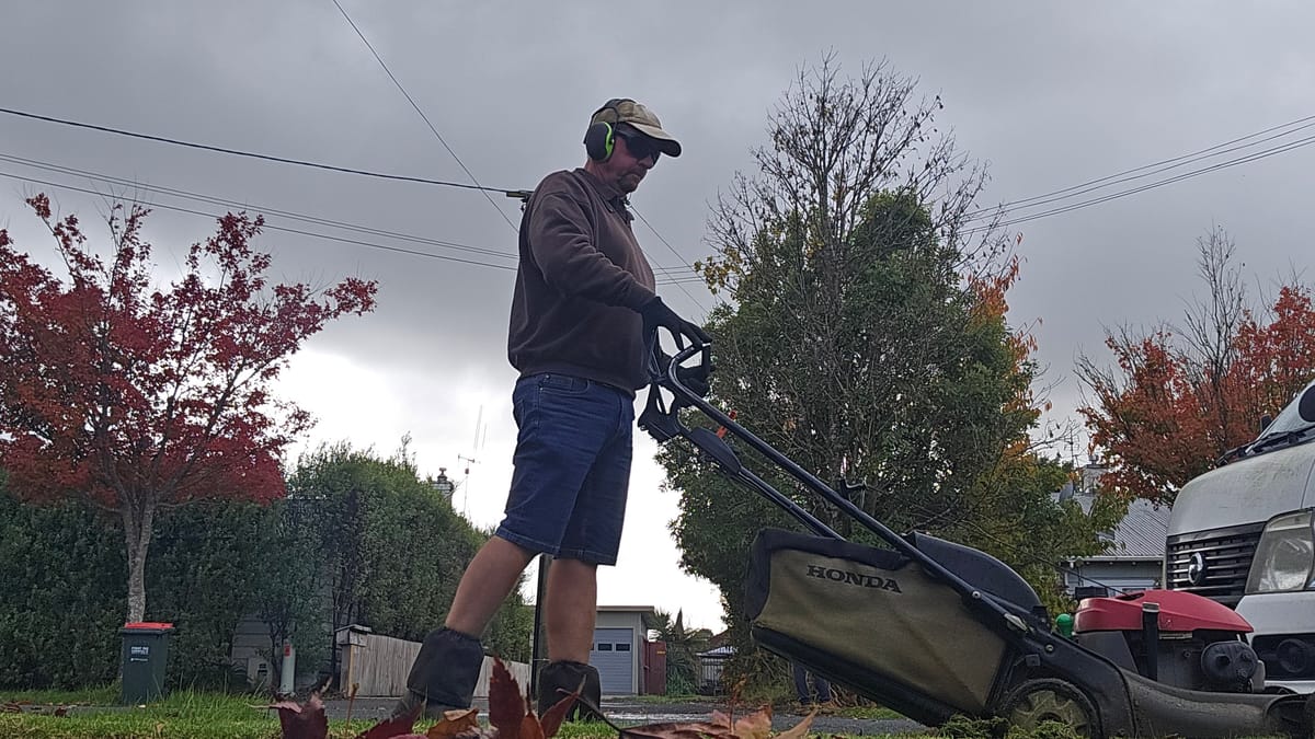 Mowing a lawn on a grey day