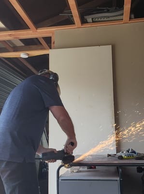 Grinding metal in the workshop
