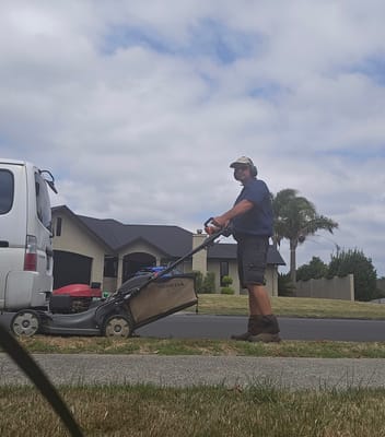 Mowing a berm next to the van