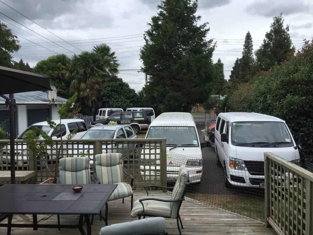 Our yard full of Gecko Lawns vans