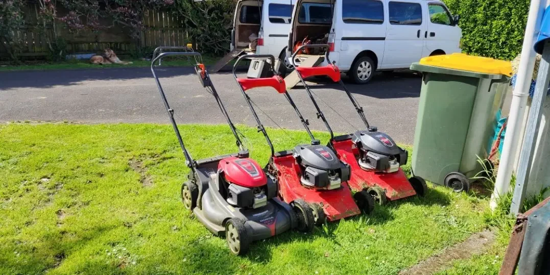 Mowers being cleaned