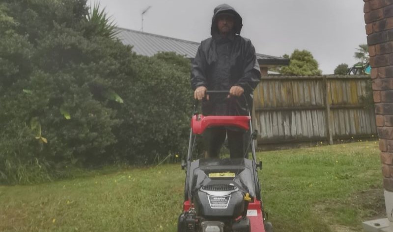 Mowing lawns in the rain