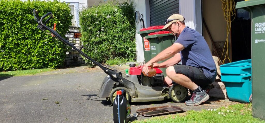 Me servicing a lawn mower