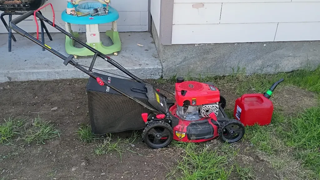 Lawn mower and petrol